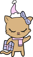 cute hand drawn line drawing of a cat with present wearing santa hat