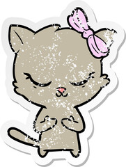 distressed sticker of a cute cartoon cat with bow