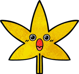 retro grunge texture cartoon of a autumnal leaf