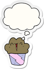 cartoon cupcake with face with thought bubble as a printed sticker