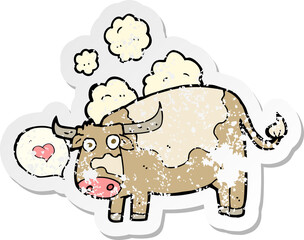 retro distressed sticker of a cartoon cow with love heart
