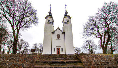 Fototapeta premium General view and architectural details of the baroque Roman Catholic church of St. Agnes built in 1924 in Goniadz, Podlasie, Poland.