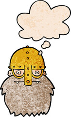 cartoon viking face with thought bubble in grunge texture style