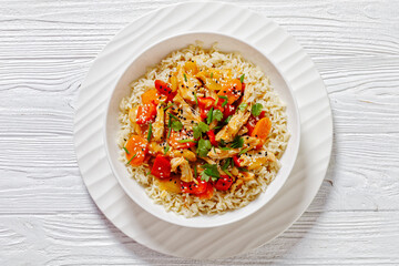 sweet and sour chicken with veggies and rice