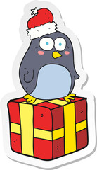 sticker of a cartoon christmas penguin