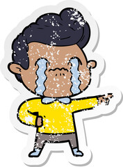 distressed sticker of a cartoon man crying