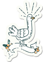 worn old sticker of a tattoo style sea bird