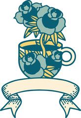 traditional tattoo with banner of a cup and flowers