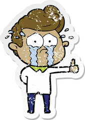 distressed sticker of a cartoon crying man