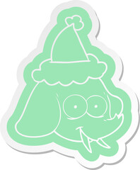 quirky cartoon  sticker of a elephant face wearing santa hat