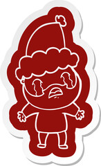 quirky cartoon  sticker of a bearded man crying wearing santa hat