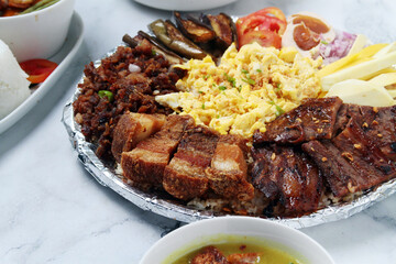 Freshly cooked Filipino food platter called Boodle Fight