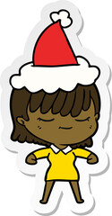 hand drawn sticker cartoon of a woman wearing santa hat