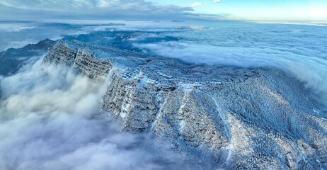 Aerial photography of snow covered Mount Emei in winter, the golden summit of Mount Emei in Sichuan(Huazang Temple), a famous Buddhist mountain in China