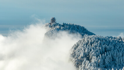 Aerial photography of snow covered Mount Emei in winter, the golden summit of Mount Emei in...