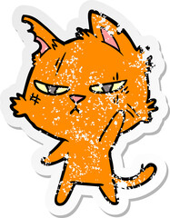 distressed sticker of a tough cartoon cat