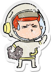 distressed sticker of a cartoon stressed astronaut
