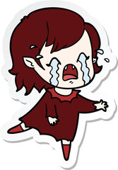 sticker of a cartoon crying vampire girl