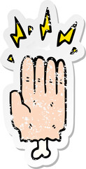 distressed sticker of a cartoon magic halloween zombie hand