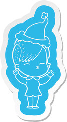 quirky cartoon  sticker of a squinting girl wearing santa hat