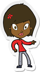 sticker of a cartoon pretty woman pointing