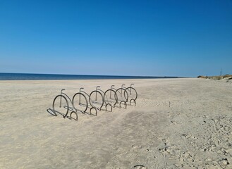 Empty bike parking stand on the beach