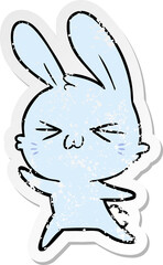 distressed sticker of a cute cartoon rabbit