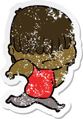 distressed sticker of a cartoon boy with untidy hair