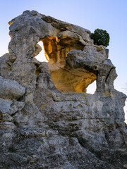 Massive rock formation with two holes near Les Baux de Provence