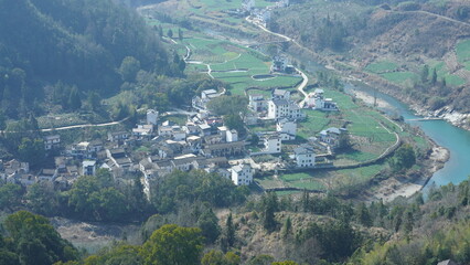 The mountains and valley view with the river running through them in spring