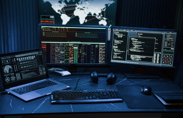 Cyber criminal haker dark room for massive attack of corporate big data servers