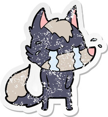distressed sticker of a cartoon crying wolf