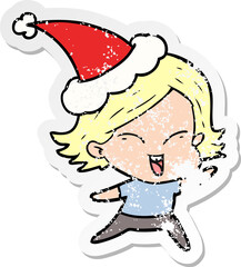 happy hand drawn distressed sticker cartoon of a girl wearing santa hat