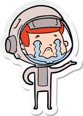 sticker of a cartoon crying astronaut
