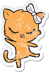 Obraz na płótnie Canvas distressed sticker of a cute cartoon cat with bow