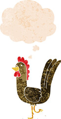 cartoon rooster with thought bubble in grunge distressed retro textured style