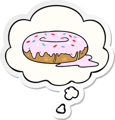 cartoon donut with thought bubble as a printed sticker