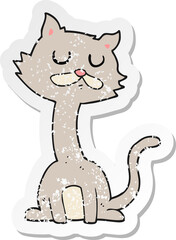 retro distressed sticker of a cartoon cat