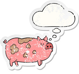 cartoon pig with thought bubble as a distressed worn sticker