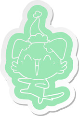 happy dancing dog quirky cartoon  sticker of a wearing santa hat