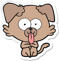 sticker of a cartoon dog with tongue sticking out