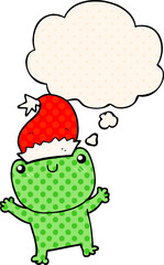 cute cartoon frog wearing christmas hat with thought bubble in comic book style