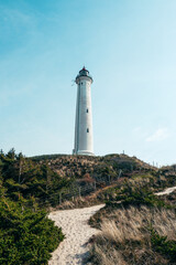 Lighthouse Lyngvig Fyr at danish west coast in spring. High quality photo