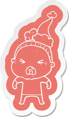 quirky cartoon  sticker of a angry old woman wearing santa hat