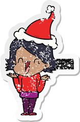 hand drawn distressed sticker cartoon of a happy woman wearing santa hat
