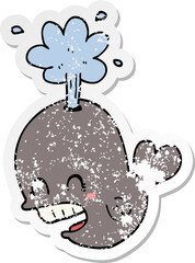 distressed sticker of a cartoon spouting whale