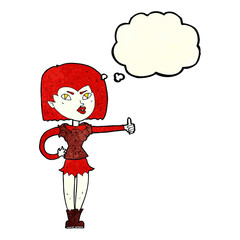 cartoon vampire girl giving thumbs up with thought bubble