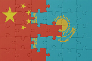 puzzle with the national flag of kazakhstan and china . macro.concept.