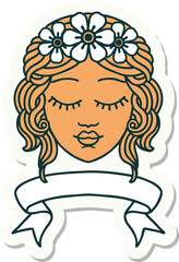 tattoo style sticker with banner of female face with eyes closed