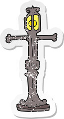 retro distressed sticker of a cartoon street lamp